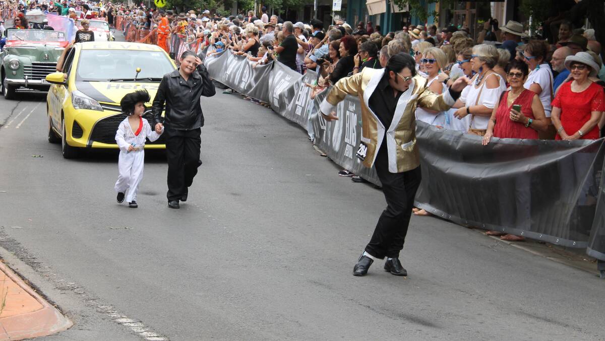 Getting into the swing during the Parkes Elvis Festival street parade. 