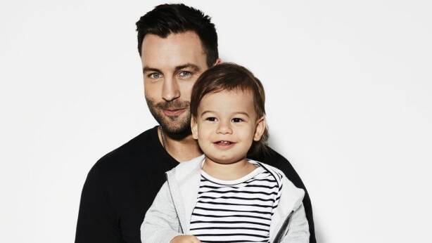 Jimmy Bartel with son Aston.  Photo: Nick Leary / Bonds