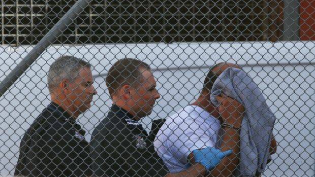 Michael Cardamone is taken into Wangaratta Court for an earlier hearing Photo: Mark Jesser

