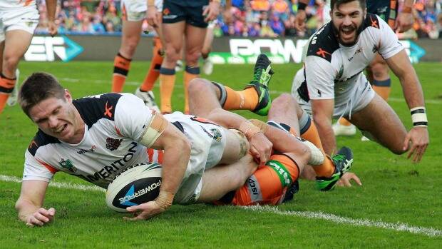 Restructure plan: Chris Lawrence may change his contract with the Wests Tigers. Photo: Getty Images