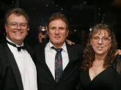 Pictured is former event supporter Rick Grossman from Hoodoo Gurus at the 2019 Child Protection Foundation Black Tie Masquerade Ball with Bruce and Kerry Fozzard, who established the charity. The event returns in 2024. Picture supplied