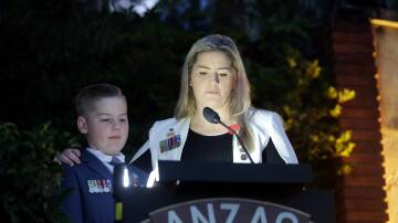 Bree Till and her son Ziggy at the Woronora River dawn service in 2021. Picture by Chris Lane
