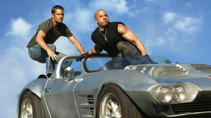 Paul Walker and Vin Diesel in scene from one of the Fast and Furious films. Photo: Supplied