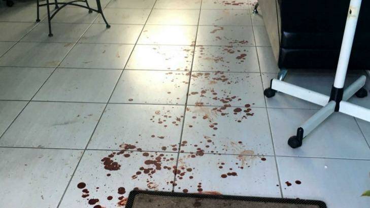 Blood on the floor of the Minto hair salon. Photo: ABC NEWS