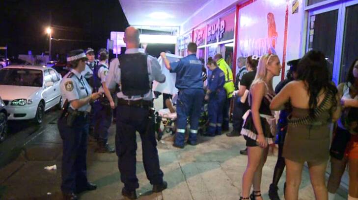 Police and the ambulance attend to the victim of a one-punch assault in St Marys on Saturday evening. Photo: Supplied