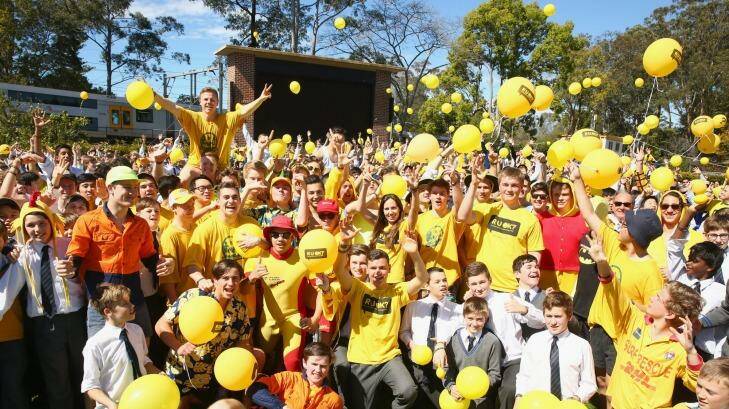 Students pose and release yellow balloons during the Knox Yellow Assembly raising awareness for RUOK? Day at Knox Grammar in Wahroonga Photo: Mark Kolbe (Fairfax Media via Getty Images)
