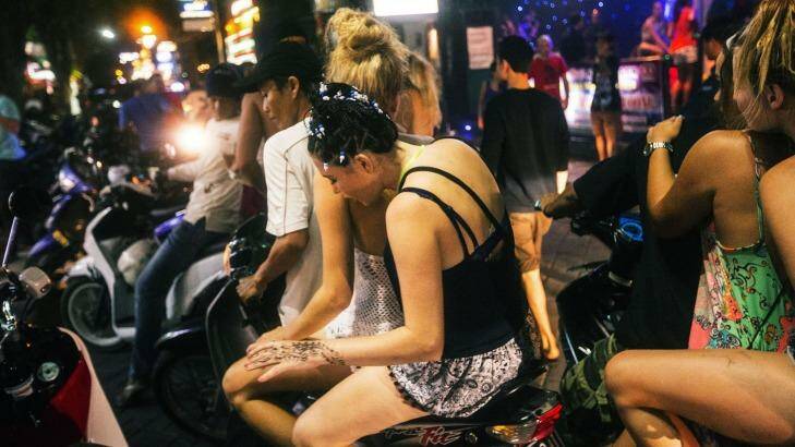 Australian schoolies live it up in Bali’s party street, Jalan Legian. Other schoolies, not pictured, say they are still taking magic mushrooms. Photo: Nic Walker