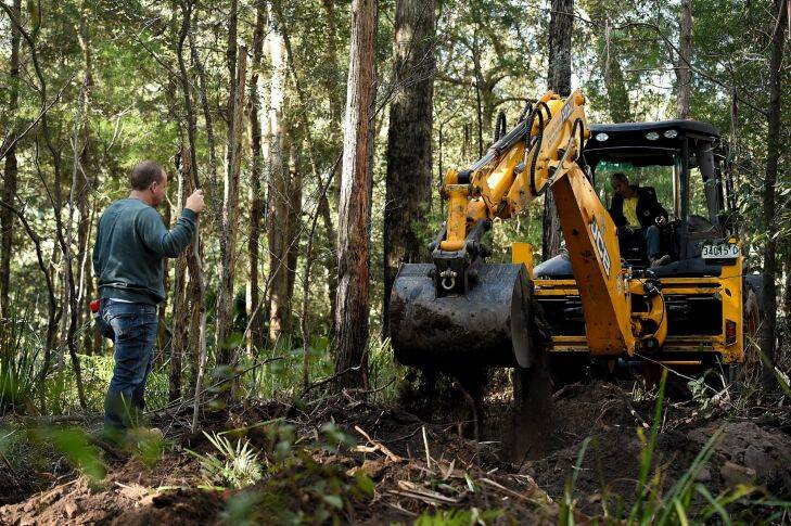 The digging resumes at the search area for the burial site of Matthew Leveson in the Royal National Park, Waterfall, Sydney. 24th May, 2017. Photo: Kate Geraghty
