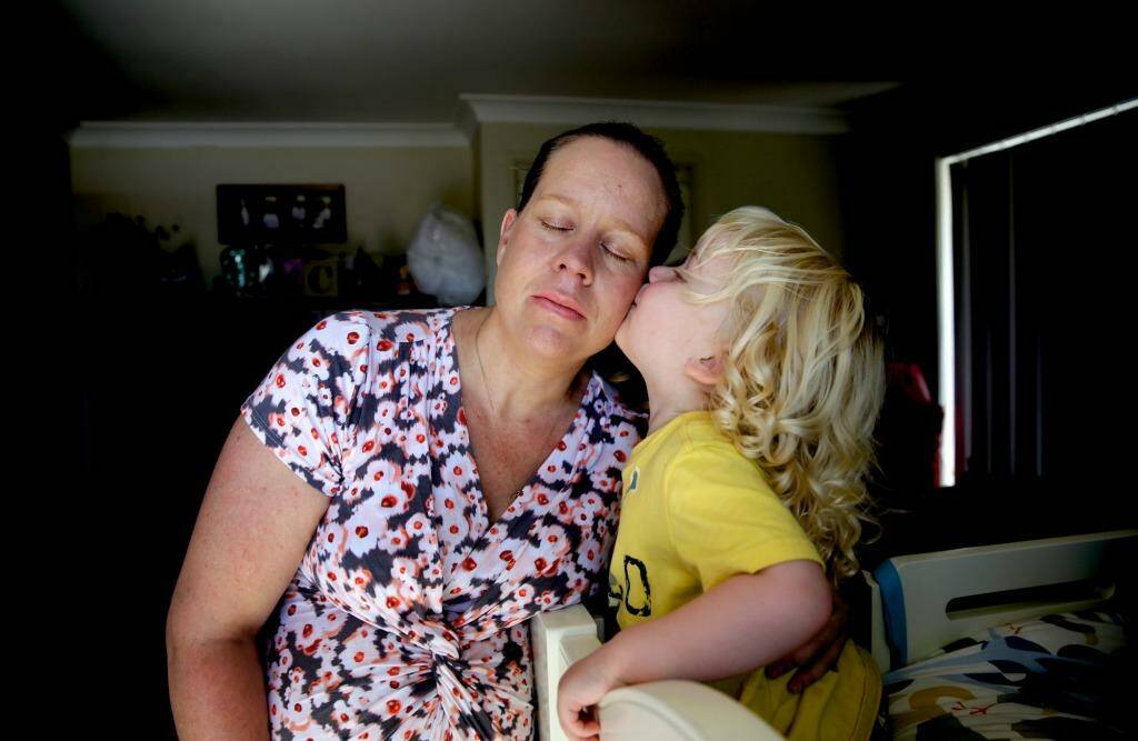 Helped through depression: Molly Hutcherson receives a kiss from son Clem, 2. She suffered mental health problems after giving birth.  Photo:  Edwina Pickles