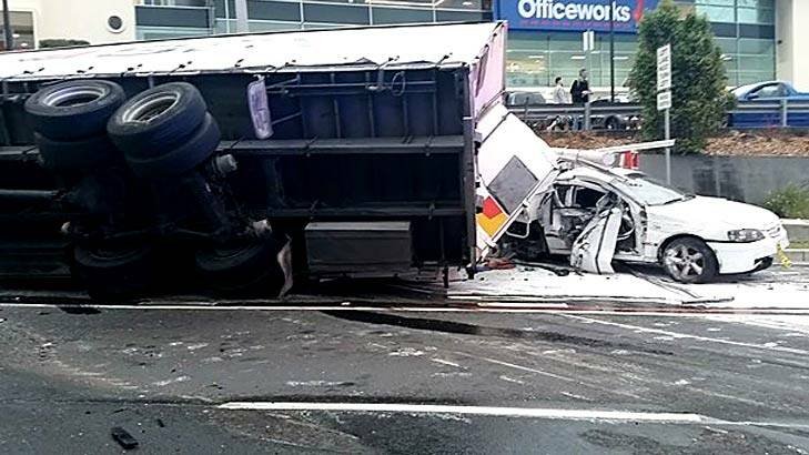 Accident: A truck overturned at the intersection of Warringah Road and Pittwater Road. Photo: Kevin Lynch, smh.com.au reader