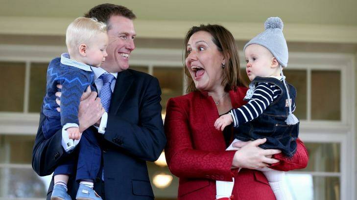 Social Services Minister Christian Porter with his son Lachlan and Financial Services Minister  Kelly O'Dwyer with her daughter Olivia at the ministerial swearing ceremony in July. Photo: Alex Ellinghausen