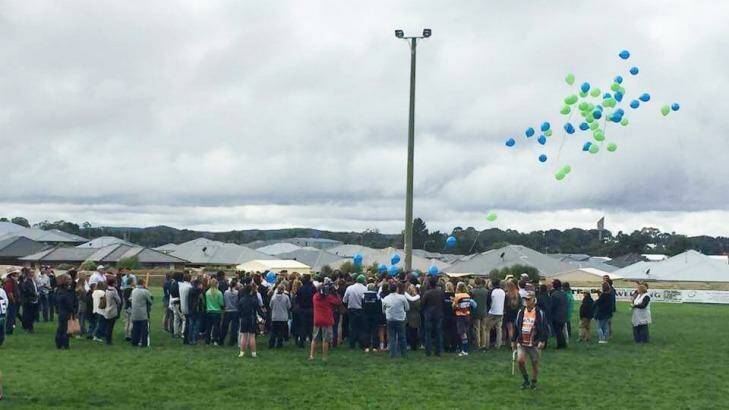 Friends gathered to release balloons for the teen, who was a student at Orange High School. Photo: Facebook