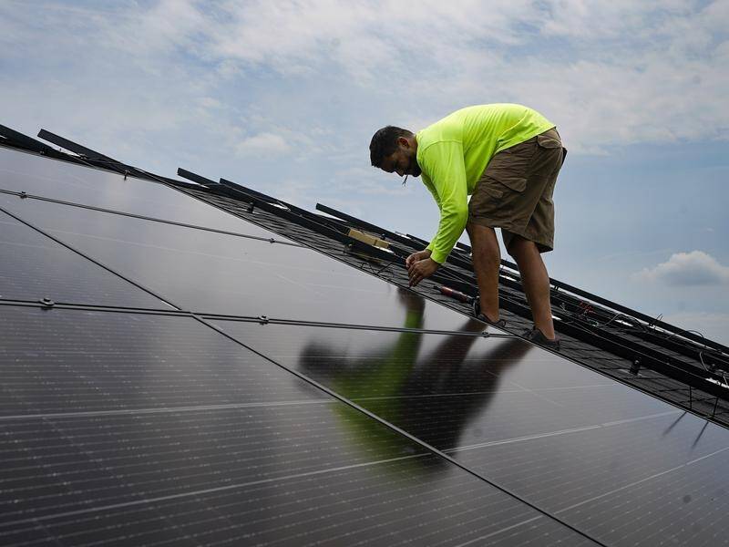 Australia's rooftop uptake is elite but only one per cent of all solar panels are locally produced. (AP PHOTO)