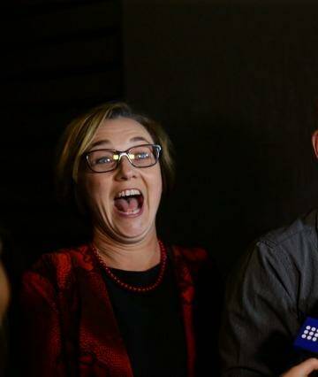 Jubilation: Jodie Harrison, who won the seat of Charlestown by a convincing margin, and John Robertson.  Photo: Jonathan Carroll