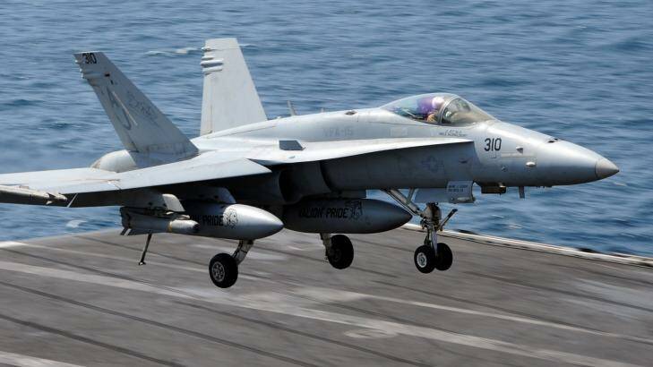 The US military is strong - but there are limits to what it can achieve in the Mideast. Pictured: an FA-18C Hornet land on the USS George H.W. Bush.