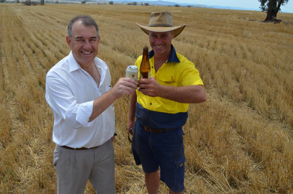 Cheers to the craft beer boom: Brewer Anthony Fitzgerald, of Tamworth, and Tamworth barley grower Gavin Hombsch look forward to fun times as the thirst for craft beer boosts demand for top-quality malt. Picture: Ruth Caskey