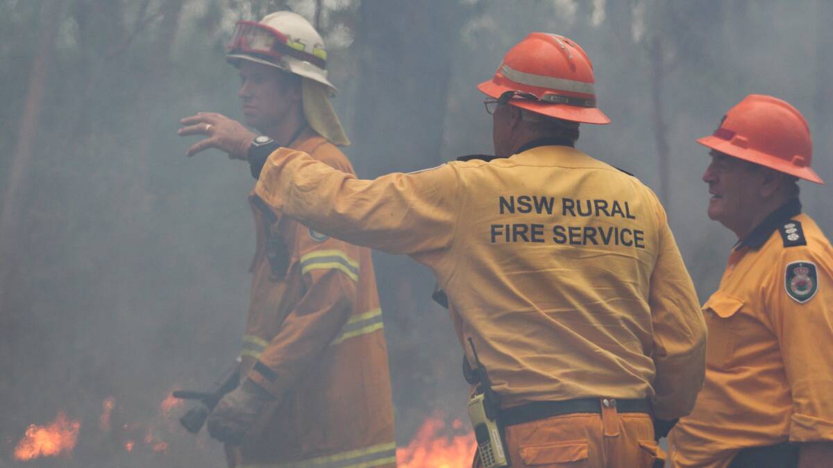 RFS crews conduct backburning operations near Chapman Parade, Faulconbridge. Photo: GEOFF JONES