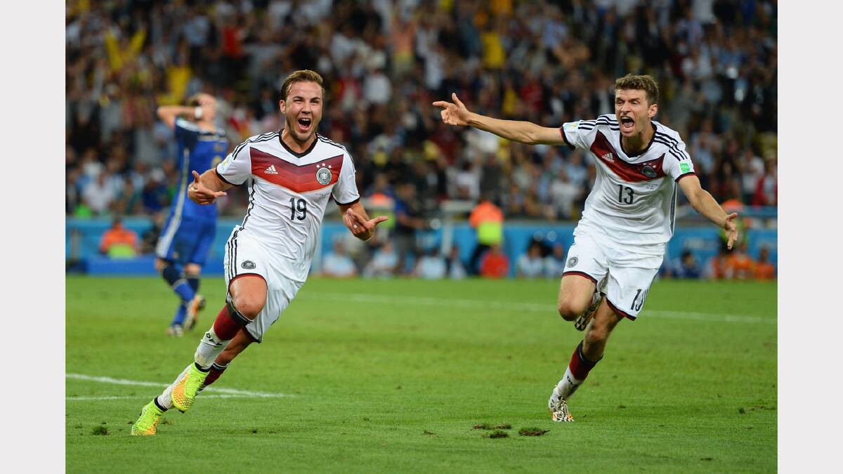 Mario Gotze and Thomas Muller celebrate after Gotze's winner. Photo: Getty Images