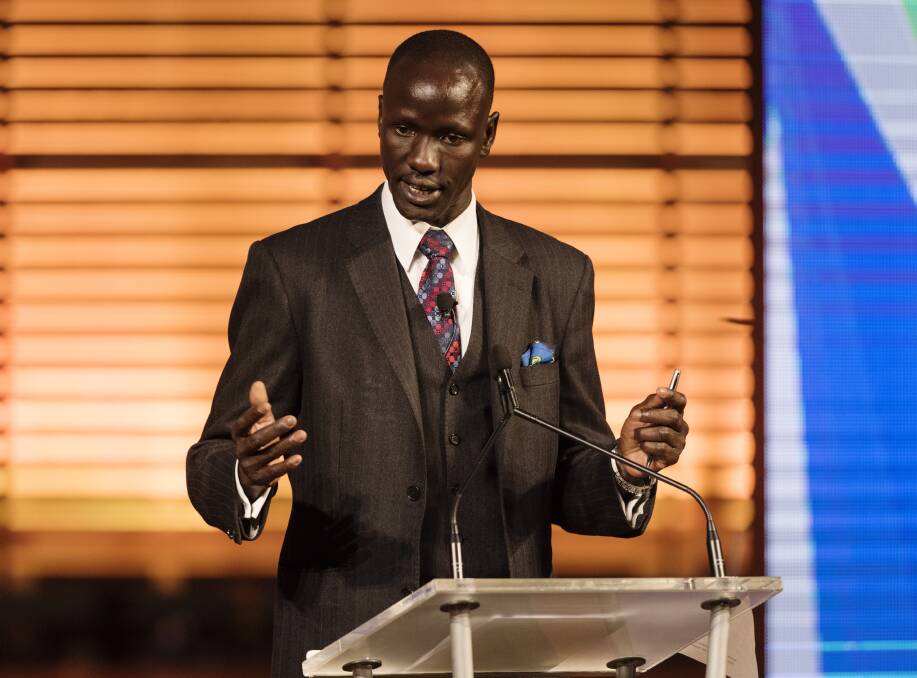 Advocate: Deng Adut ended his summit address with: ''It's important to remember across western Sydney, there are thousands of stories just as inspiring as mine.''