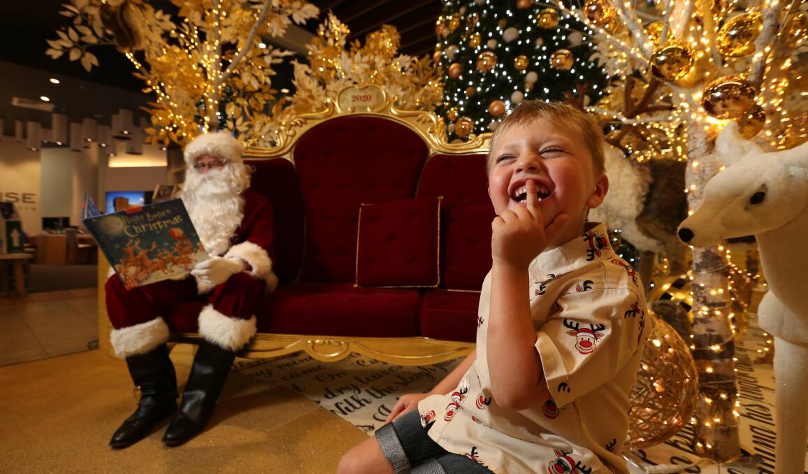 He may not be sitting on Santa's knee but this year's Santa photo of four-year-old Nicholas Lambie is sure to be cute. Picture: Simone De Peak