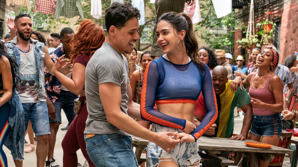 Joyful: Anthony Ramos and Melissa Barrera star as Usnavi and Vanessa in Lin-Manuel Miranda's In the Heights film, rated PG, which hit cinemas before lockdown. Picture: Warner Bros