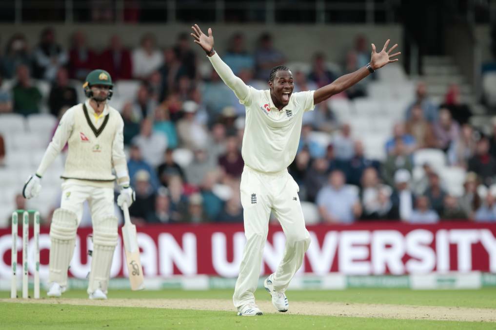 England's Jofra Archer celebrates after taking his 6th wicket, that of Australia's Nathan Lyon, on the first day of the third Ashes Test.