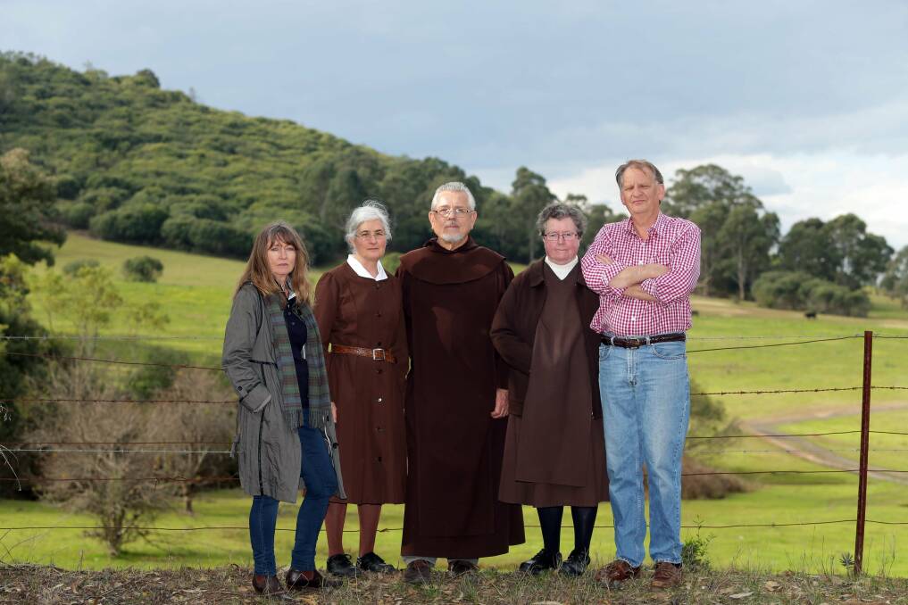 Over our dead body: Jacqui Kirkby (left) and her husband Peter Gibbs (right) with (left to right) Sister Jocelyn Karmer, Father Paul Maunder, Sister Jennifer Jones from the Discalced Carmelites. Picture: Chris Lane