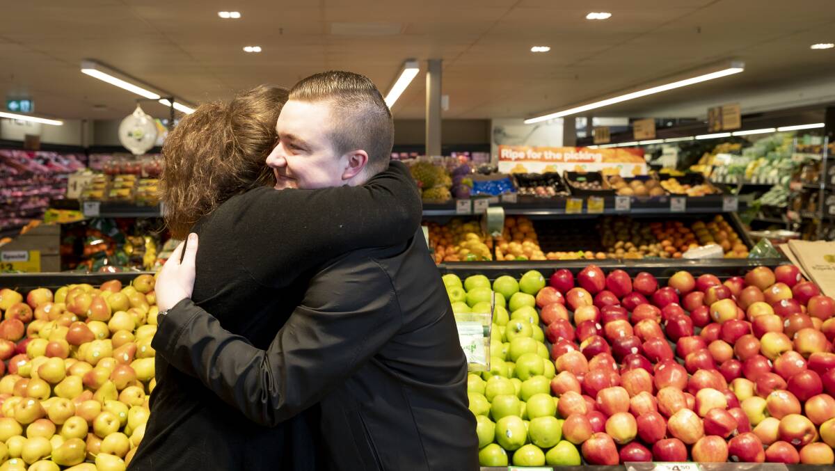 Hamish Flanagan helped a woman in need at Woolworths in the ACT. Photo: Sitthixay Ditthavong
