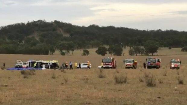 Emergency services at the scene of the hot air balloon crash in the Hunter region. Photo: The Singleton Argus