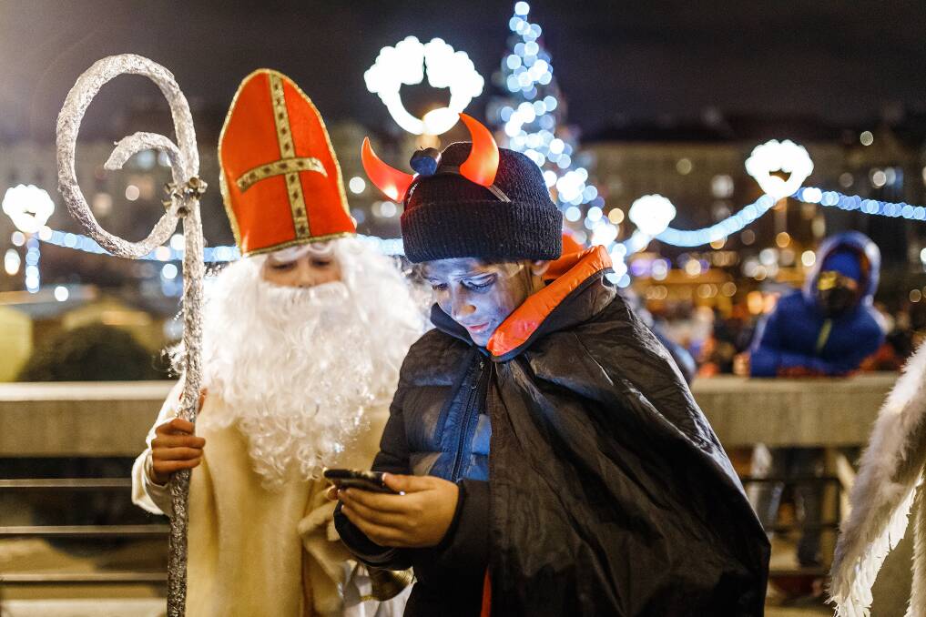 St Nicholas Day in Prague sees people dress as St Nicholas and a Devil. Picture: Shutterstock
