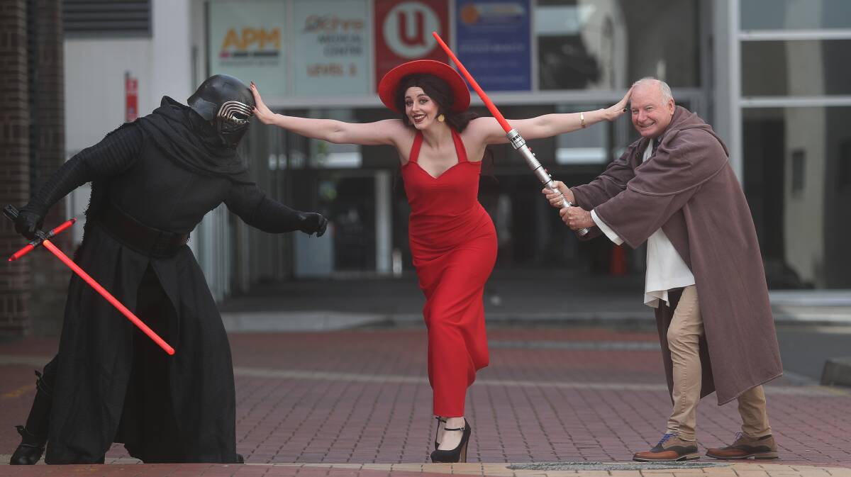 Cosplayers Jason Zimmerman, Emily Coleman and Lord Mayor Gordon Bradbery are ready for Comic Gong. Picture: Robert Peet