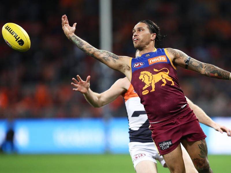 The Brisbane Lions have slammed the online racist comments aimed at Allen Christensen (pic).
