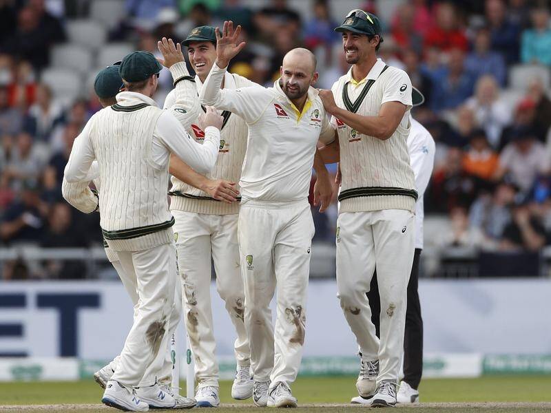 Nathan Lyon (C) took two second innings wickets to help Australia win the fourth Test.