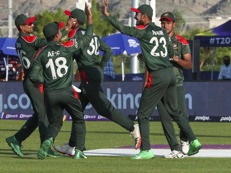 Bangladesh comfortably defeated Papua New Guinea in the Twenty20 World Cup, in Muscat, Oman.