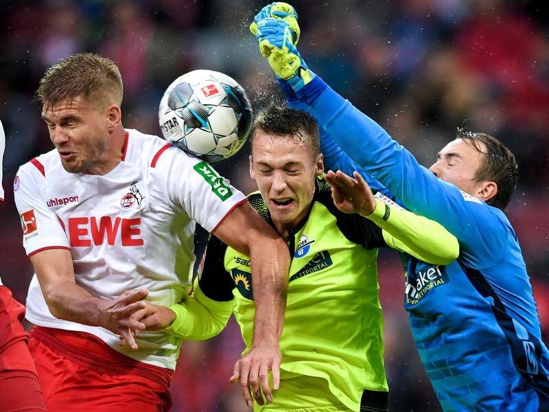 Cologne have beaten fellow strugglers 3-0 in a cellar battle in the German Bundesliga.