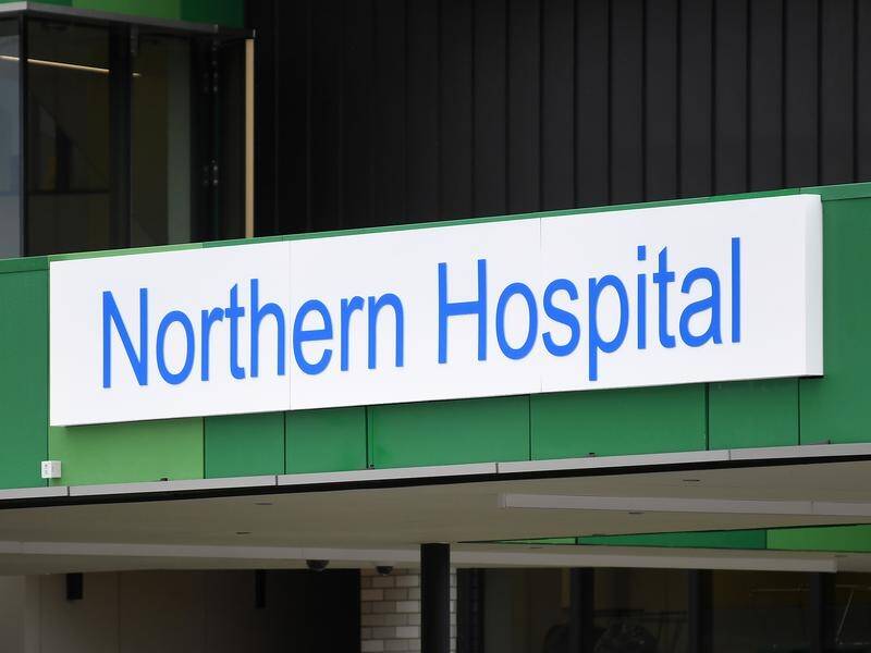 Three men have been charged over a brawl with security guards and police at Northern Hospital.