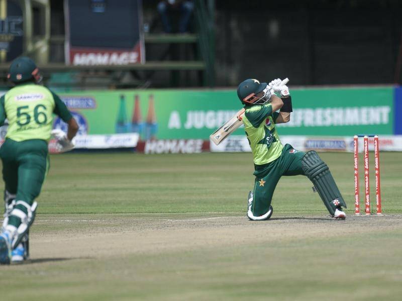 Pakistan's Mohammad Rizwan smashes a boundary in his match-winning 91 not out against Zimbabwe.