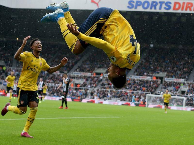 Striker Pierre-Emerick Aubameyang celebrates scoring Arsenal's winner at Newcastle.