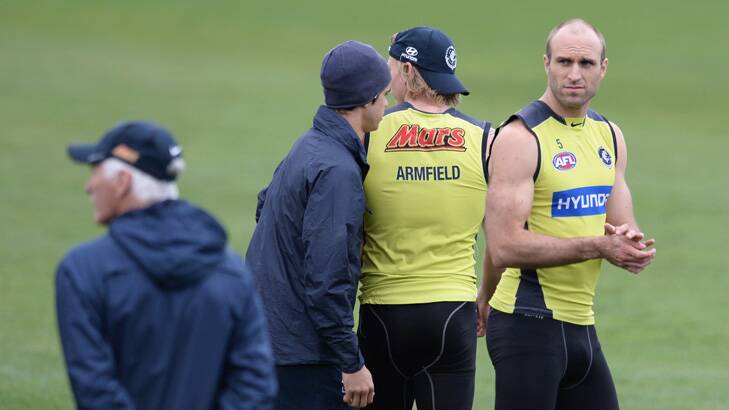 Steady hand: Carlton coach Mick Malthouse keeps an eye on the players, including Chris Judd (right), at training on Wednesday. Photo: Justin McManus