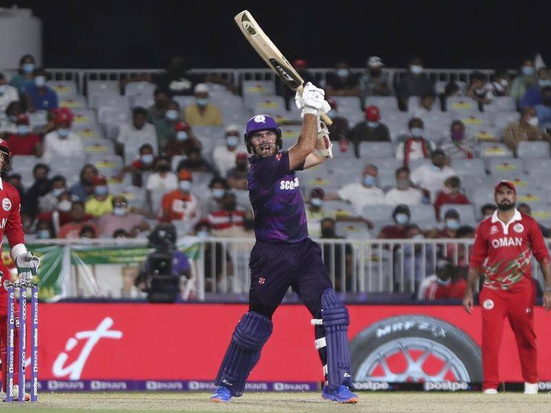 Scotland captain Kyle Coetzer hit 41 to lead his team into the second phase of the T20 World Cup.