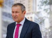 Premier Roger Cook says his government is committed to tackling the inequity faced by women in WA. (Richard Wainwright/AAP PHOTOS)