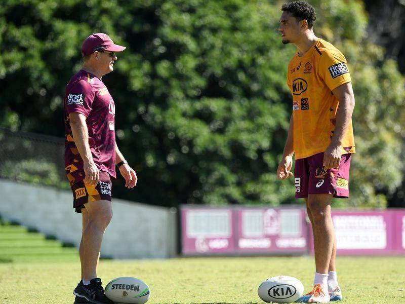 Brisbane coach Kevin Walters (l) is adamant Xavier Coates (r) will remain with the Broncos.