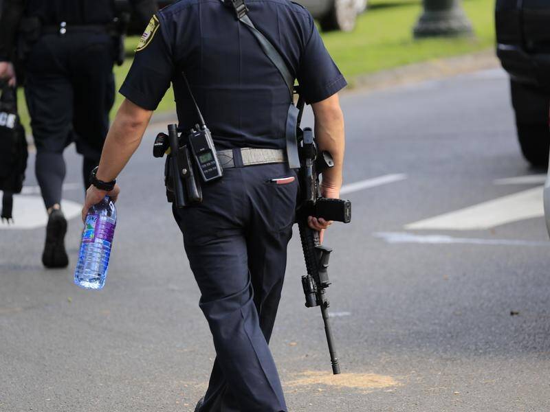 Two police officers have been fatally shot by a gunman in Hawaii.