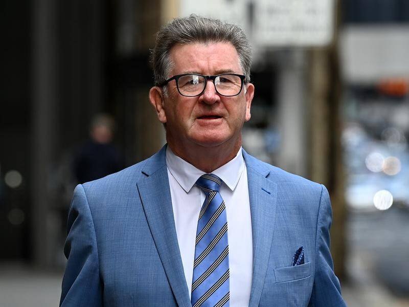 Stephen Barrett is on trial over an alleged extortion plot against white-collar criminals.