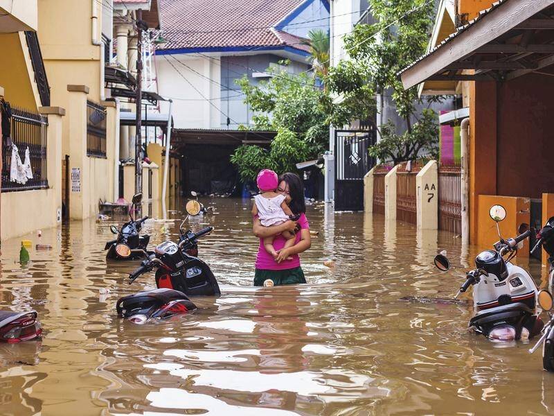 Thousands of Indonesians have had to leave their homes due to flooding in South Sulawesi.