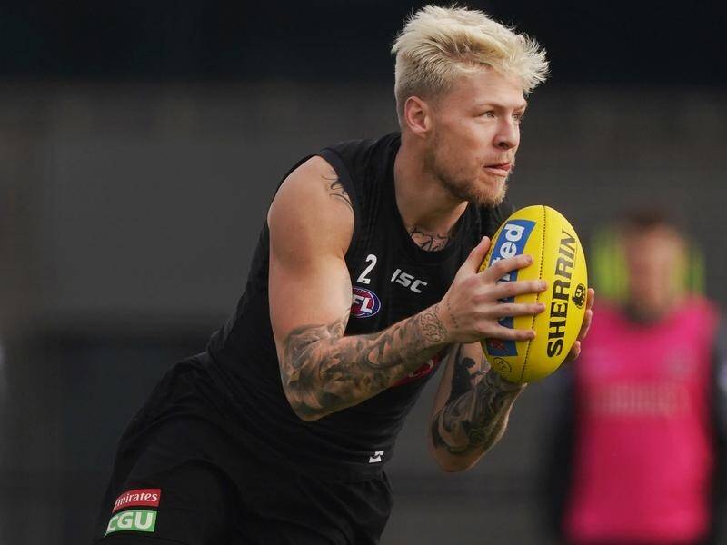 Jordan de Goey is poised to return to Collingwood's AFL team to face Geelong in Perth.
