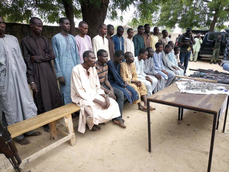 Some of the 22 alleged Boko Haram fighters arrested in recent weeks by Nigerian police.