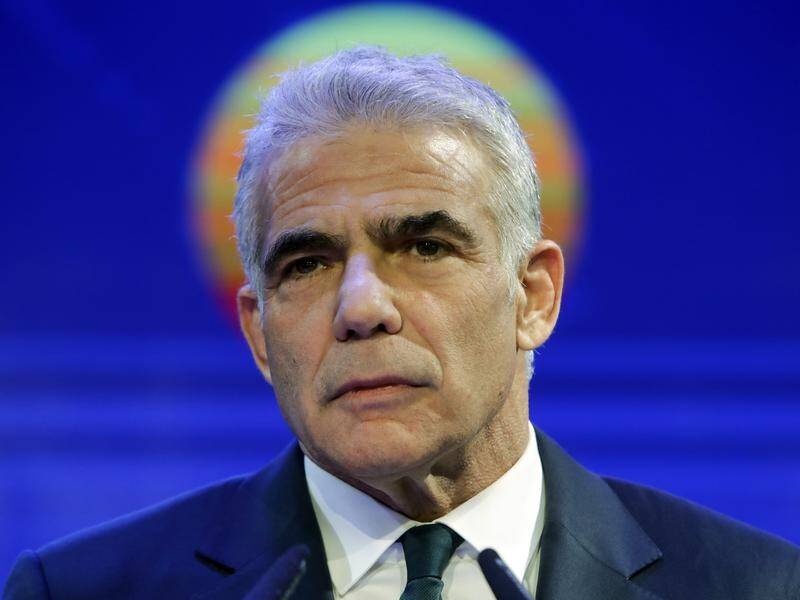 Israel's president says Yair Lapid has the pledged support of 56 of parliament's 120 members.