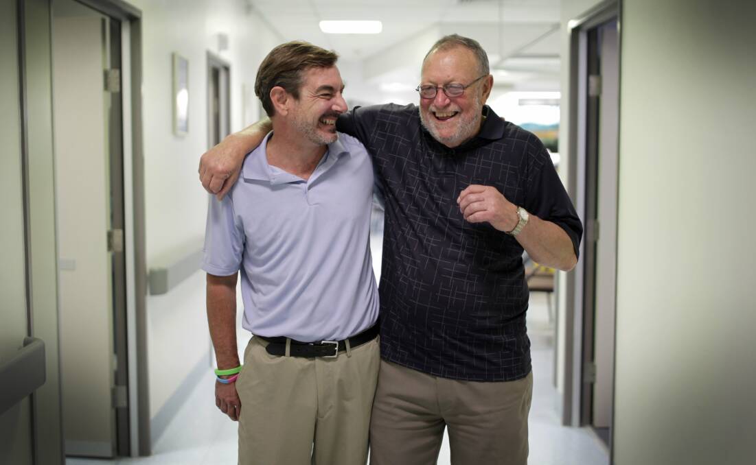 Much in common: Breast cancer survivor Will Roth (left) and Macarthur Cancer Therapy Centre patient Ken Stonestreet share a laugh. Picture: Simon Bennett