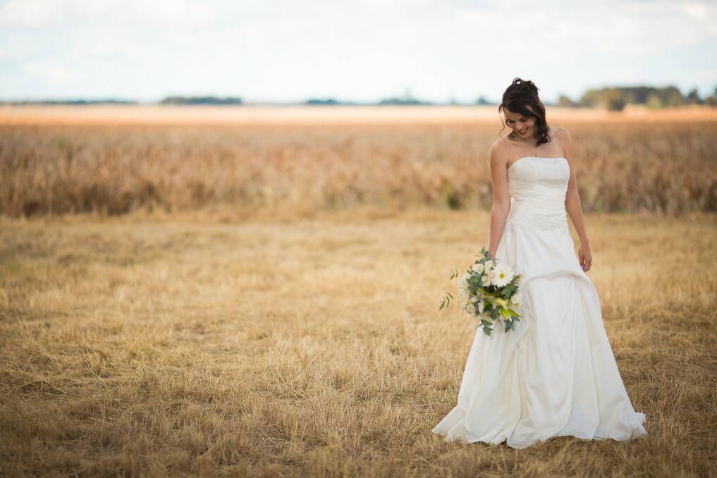 Drought Angels is selling designer wedding dresses to go towards their drought support. Pictures: Carla Yeo Photography